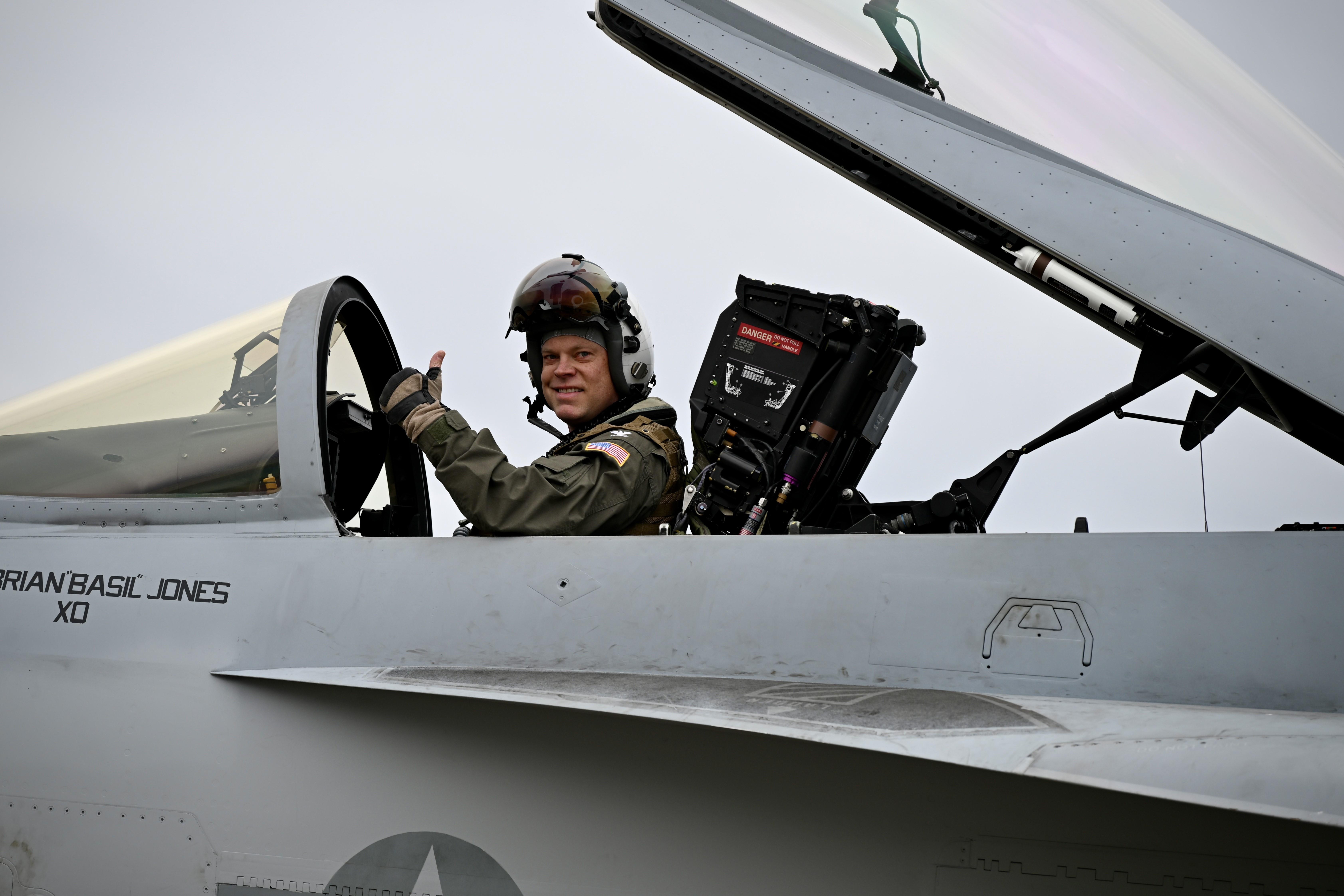 Commanding Officer of NAS Oceana inside a plane